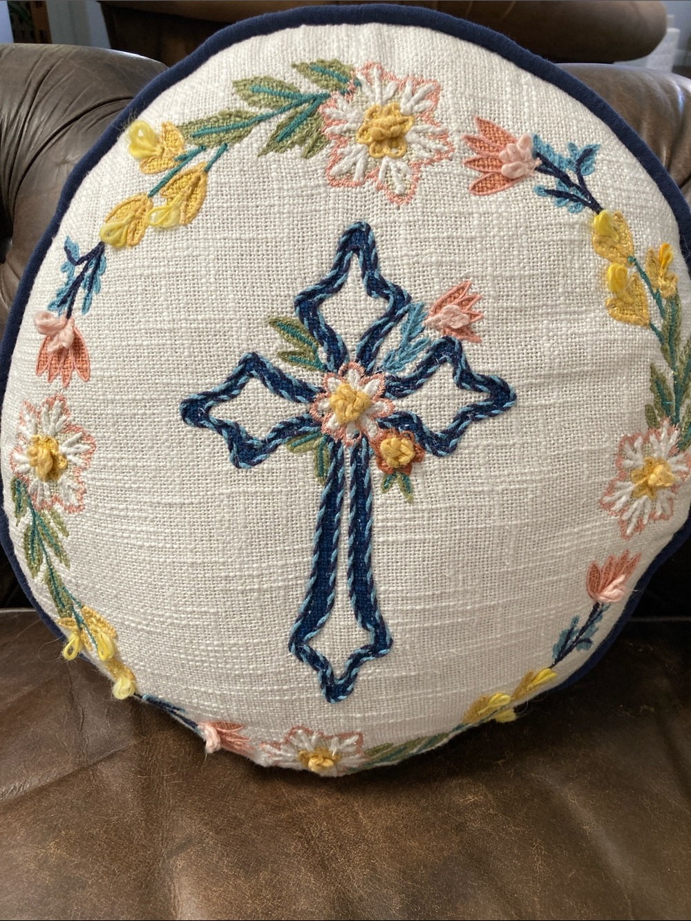 Round Embroidered 16-inch Cross Accent Pillow in Cream & Blue